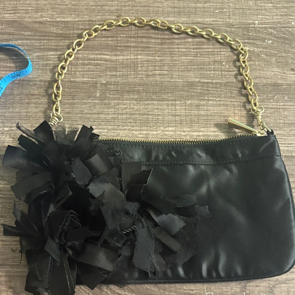 Express Black Clutch with Gold Chain and Floral Detail